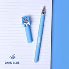 Light blue pen and blue cap on a lined notebook page with 'Mika' branding.