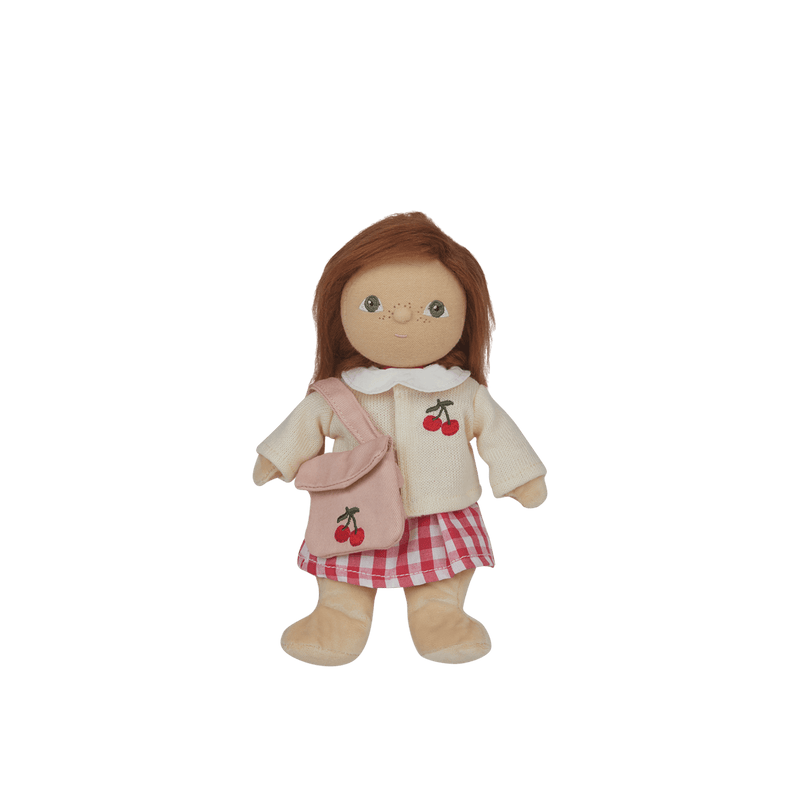 Plush toy doll with a pink outfit and cherry design on a transparent background