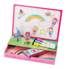 Floss & Rock Magnetic Scene & Doodle Set in the Rainbow Fairy theme, showing its open box setup with a magnetic play scene, standing figures, magnetic pens, and a doodle board drawer.