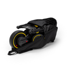 Folded scooter inside a black carrying bag on a white background