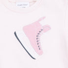 Pink high-top sneaker with white sole on a light pink background, featuring 'Angel Dear' branding.