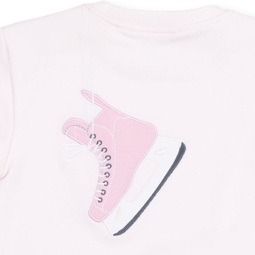 Pink high-top sneaker with gray sole on a white background