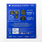 Back of reusable paper packaging with illustrations and text on a blue background