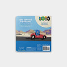 Product packaging with a cartoon character in a car on a mountainous landscape.