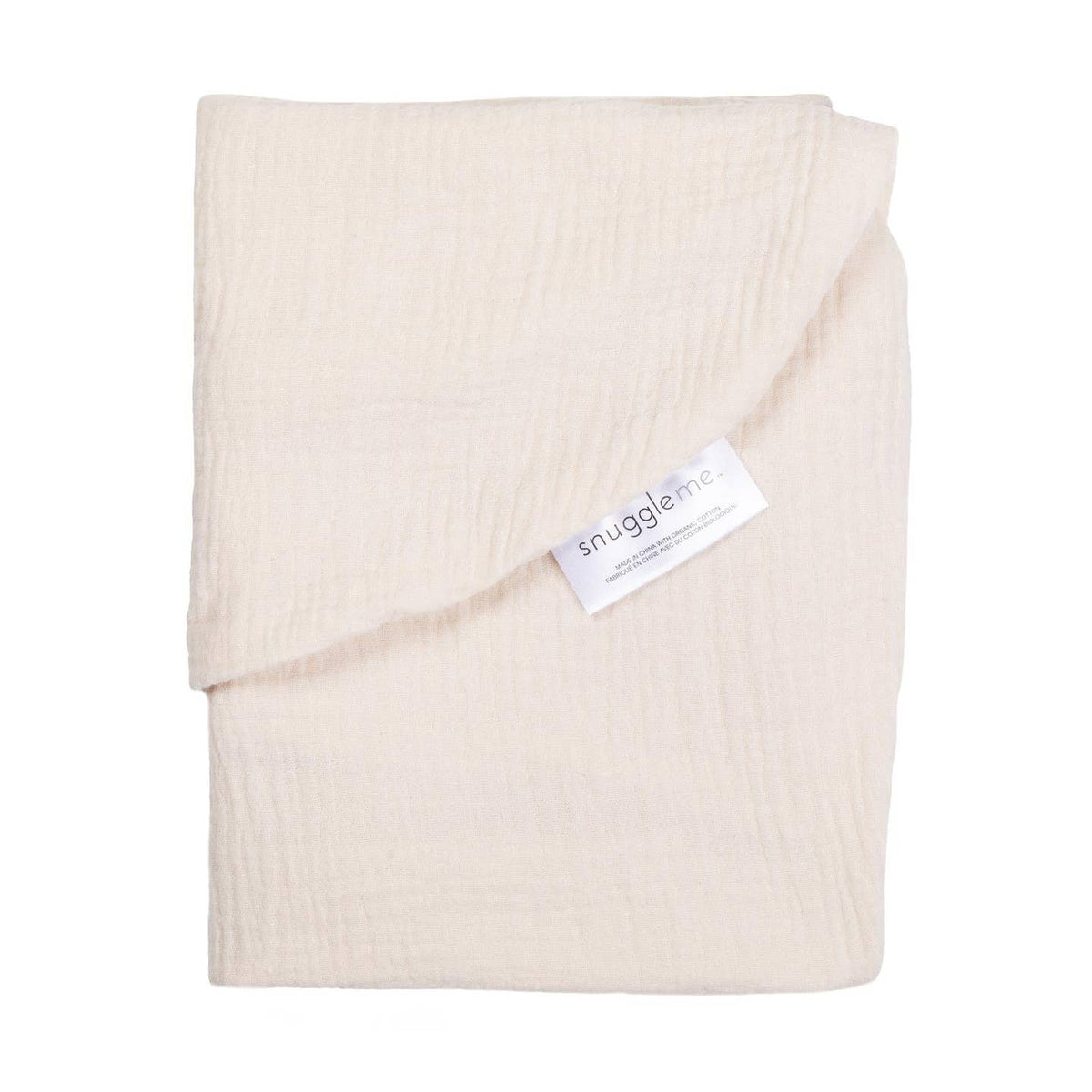 Folded beige blanket with a 'snugglemus' tag on a white background