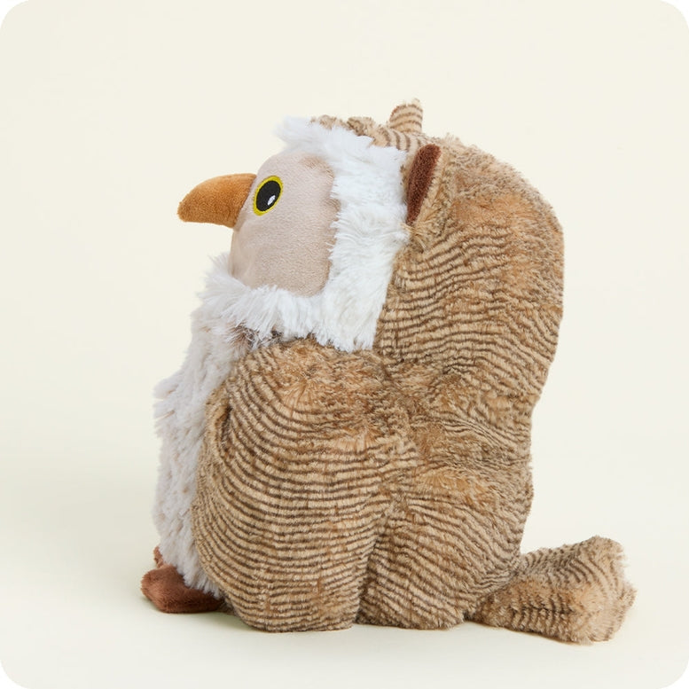 Woodland Owl by Warmies plush toy featuring brown and white textured fur, round yellow eyes, and an orange beak against a plain white background.