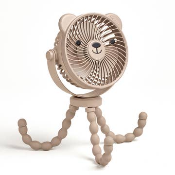 Beige fan shaped like a lion on a white background