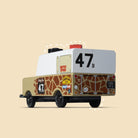 Toy truck with number 47 on a beige background