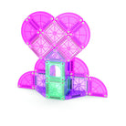 Pink and green geometric building block set on a white background