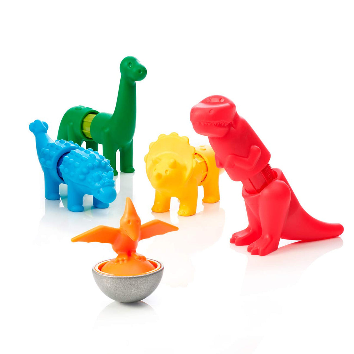 Colorful dinosaur-shaped objects on a white background