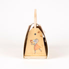 Wooden bell with a mouse design on a white background