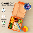 Person using a lunch box for hot food and an insulated tray for cool foods.