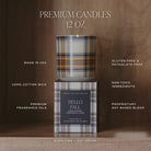 A lit 12 oz premium candle in a plaid-patterned glass jar sits on top of its matching box. The candle packaging and jar feature a brown, beige, and black plaid design, with white text overlays highlighting product features such as 'PREMIUM CANDLES 12 OZ', 'MADE IN USA', and 'HELLO FALL'.