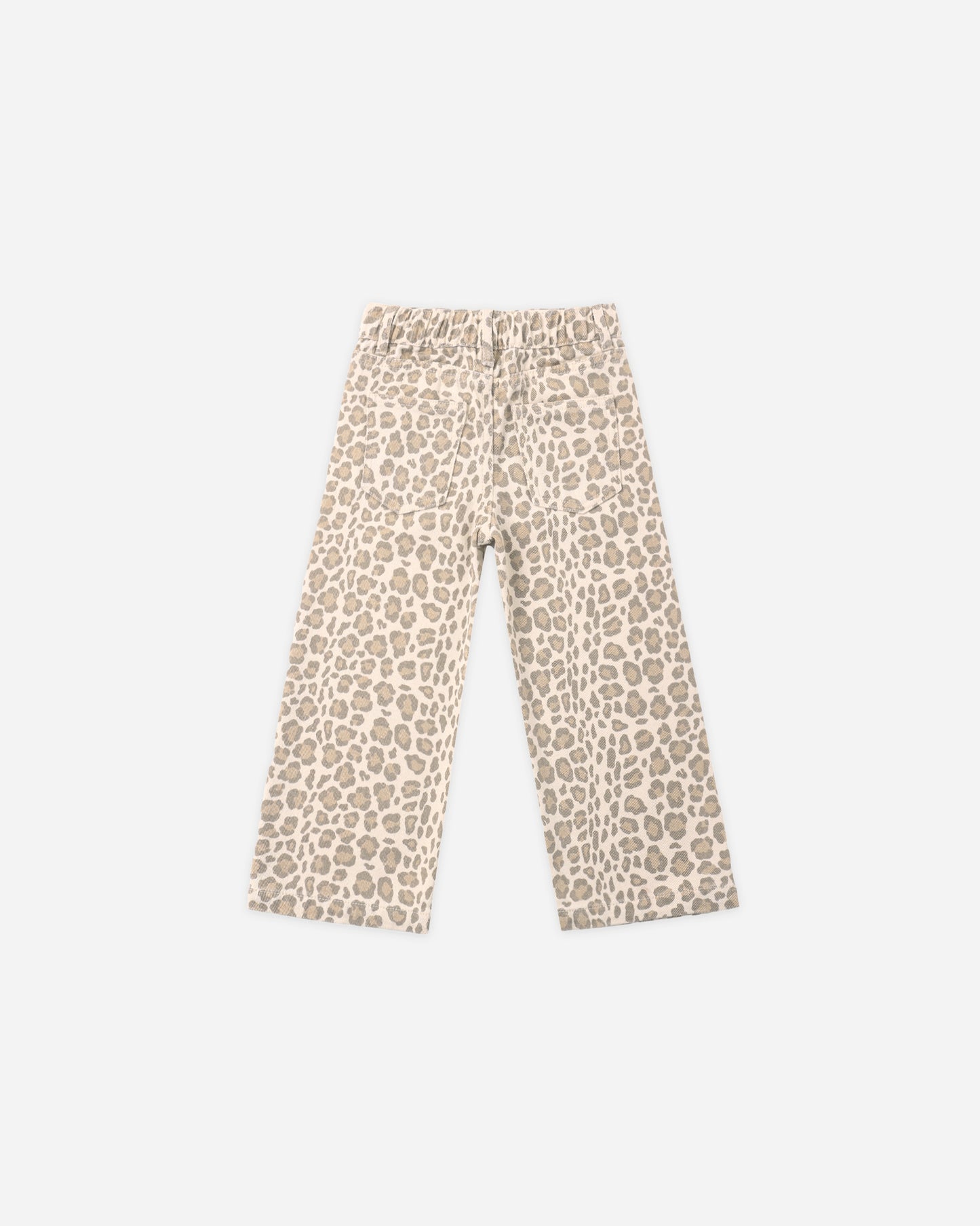 A pair of wide-leg cropped pants featuring an all-over beige and brown leopard print pattern on a cream background.