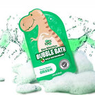 Dino Adventure bubble bath packaging with water and foam on a white background