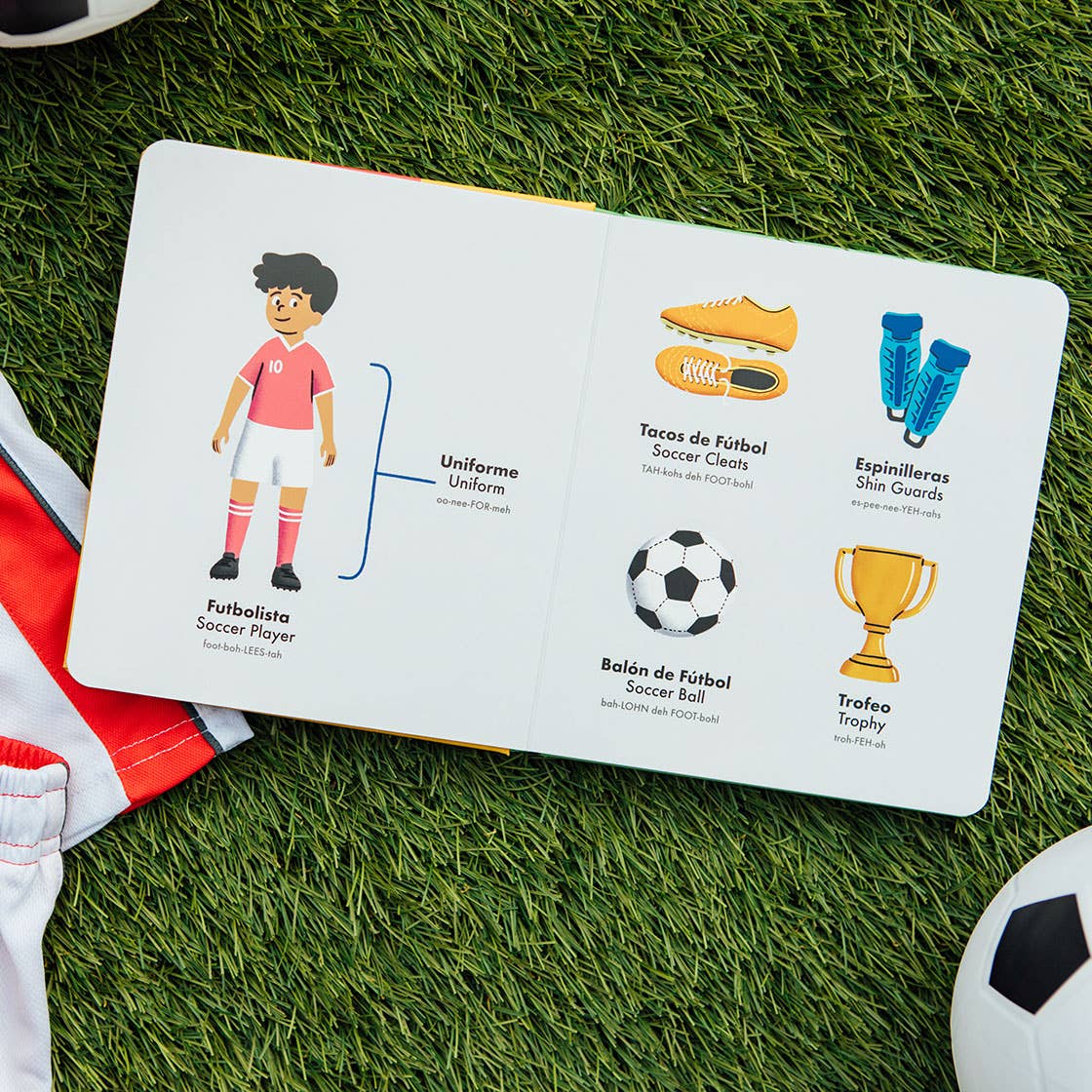 Children's book about soccer on grass with soccer ball and jersey