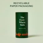 Green cylindrical container with 'The Everywhere Stick' text and 'kate mclean' branding on a light green background.