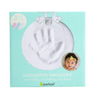 Turquoise product box featuring a white handprint keepsake ornament with a white ribbon, and a photo of a baby in the corner.