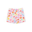 Colorful shorts with fruit pattern on a white background