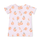 White t-shirt with peach pattern on a white background