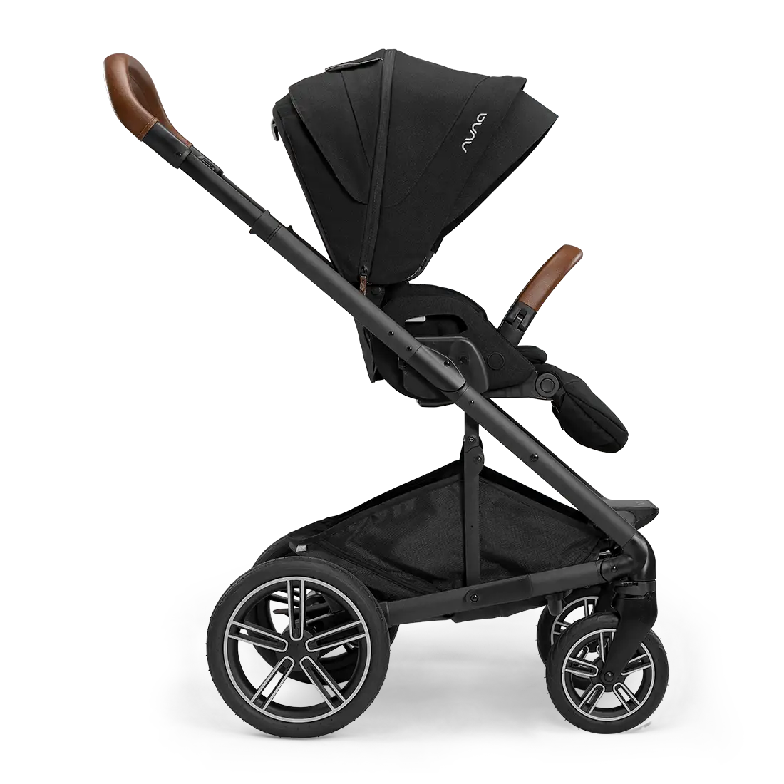 A profile view of a black MIXX Next + Pipa Aire RX Travel System by Nuna stroller featuring brown leatherette handlebar and armbar accents, shown against a checkered transparent background.