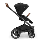 A profile view of a black MIXX Next + Pipa Aire RX Travel System by Nuna stroller featuring brown leatherette handlebar and armbar accents, shown against a checkered transparent background.