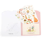 Set of animal-themed stickers in an open envelope with a pink interior.