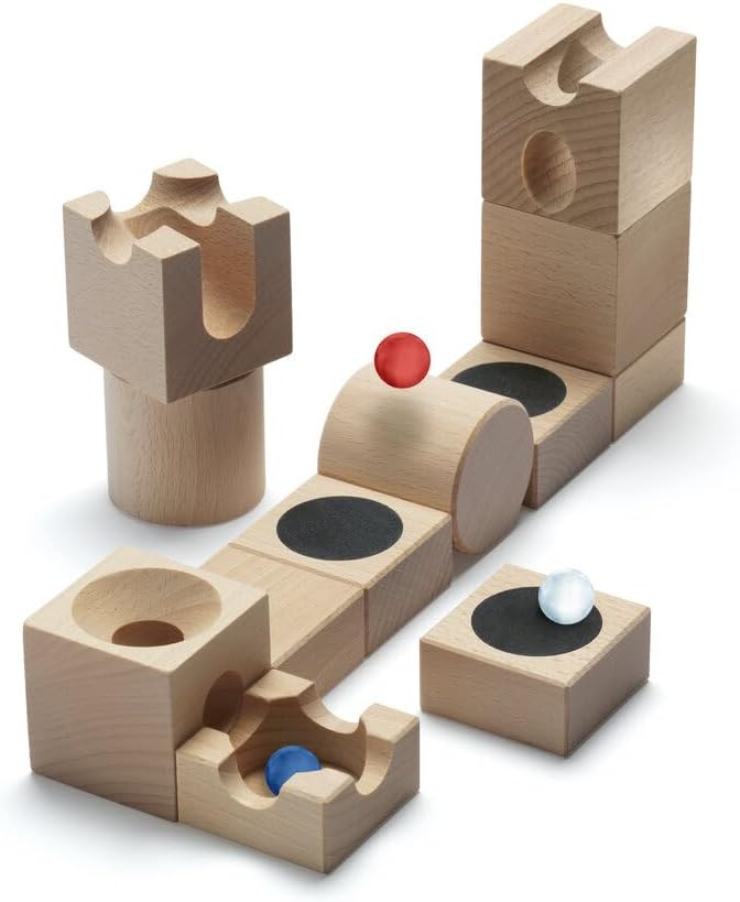 Wooden marble run puzzle with marbles on a white background