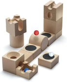 Wooden marble run puzzle with marbles on a white background