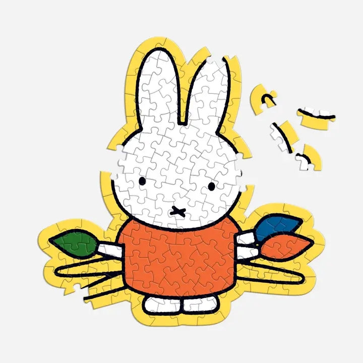 Children's puzzle with a cartoon rabbit character on a white background