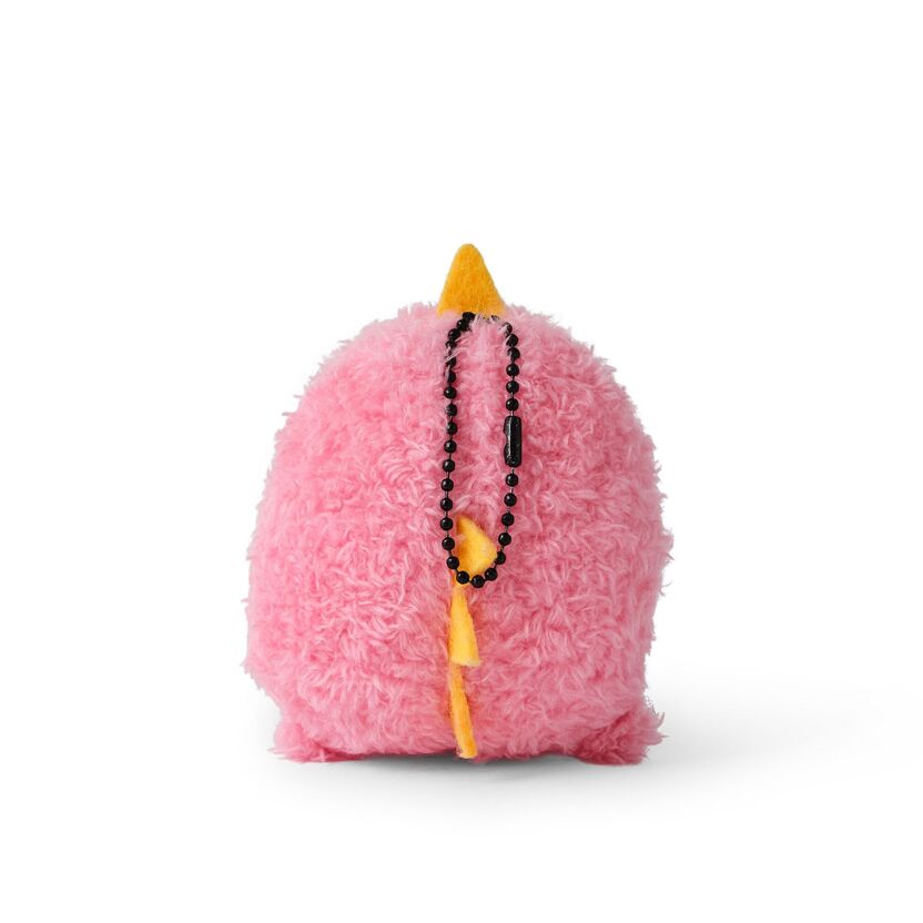 Pink fluffy toy with a yellow beak and black beads on a white background