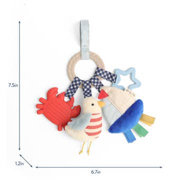 Colorful baby rattle toy with measurements on a white background