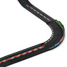 Model race track with a curved section on a white background