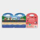 Packaging of a road and rail track set with a scenic design on a white background