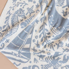 Close-up of blue and beige patterned fabric