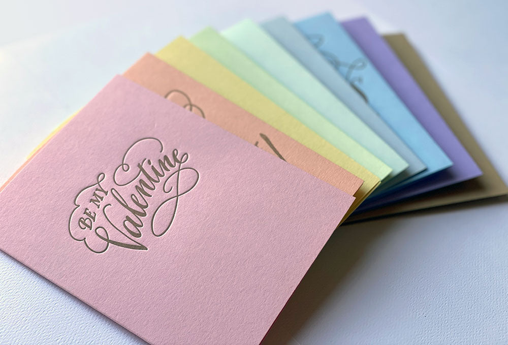 Set of colorful greeting cards with 'Be my Valentine' text on a white background