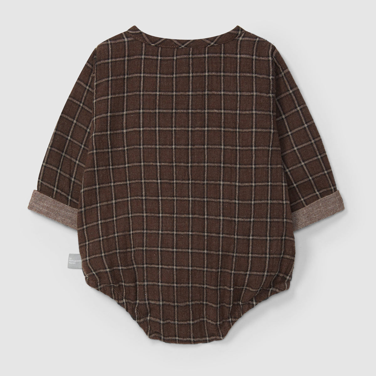 Brown checkered baby romper on a light gray background