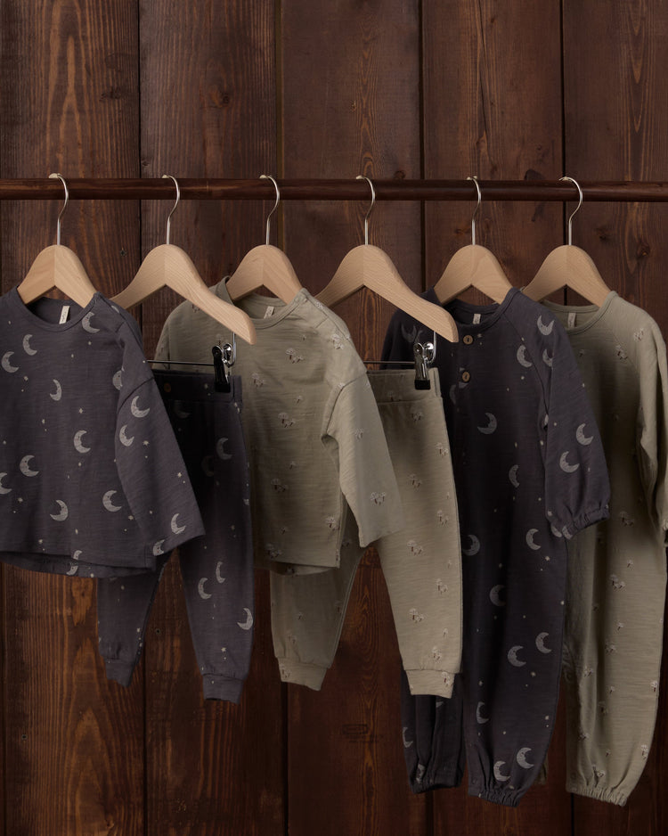 Rylee + Cru Long Sleeve Tee + Pant Set in Moons alongside matching pieces featuring a celestial moon print.