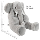 Gray plush elephant toy with measurements on a white background