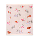 Baby blanket with butterfly and flower pattern on a light pink background