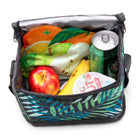  insulated lunch bag with colorful design filled with food items on a white background