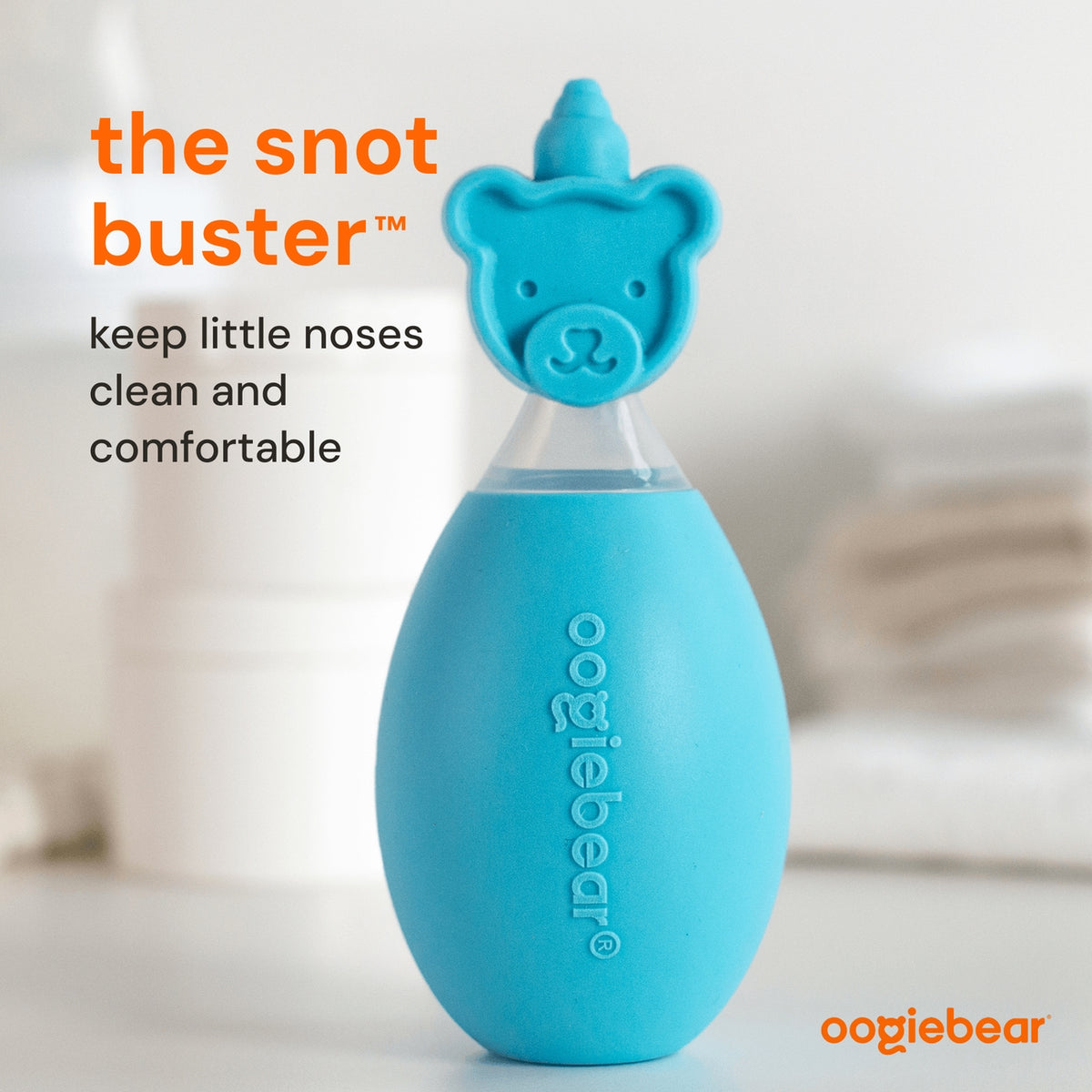 Blue bottle labeled 'the snot buster' by oogiebear on a white background