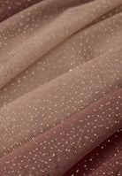 Brown fabric with gold polka dots