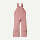 A pair of pink snow bib overalls with adjustable shoulder straps and reflective silver trim near the lower legs, shown against a plain off-white background.