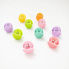Set of colorful small round objects on a white background