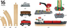 Toy set with various pieces including tracks, trains, and a cargo ship on a white background.