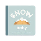 Book titled 'Snow Baby' with mountain illustration on a light blue background