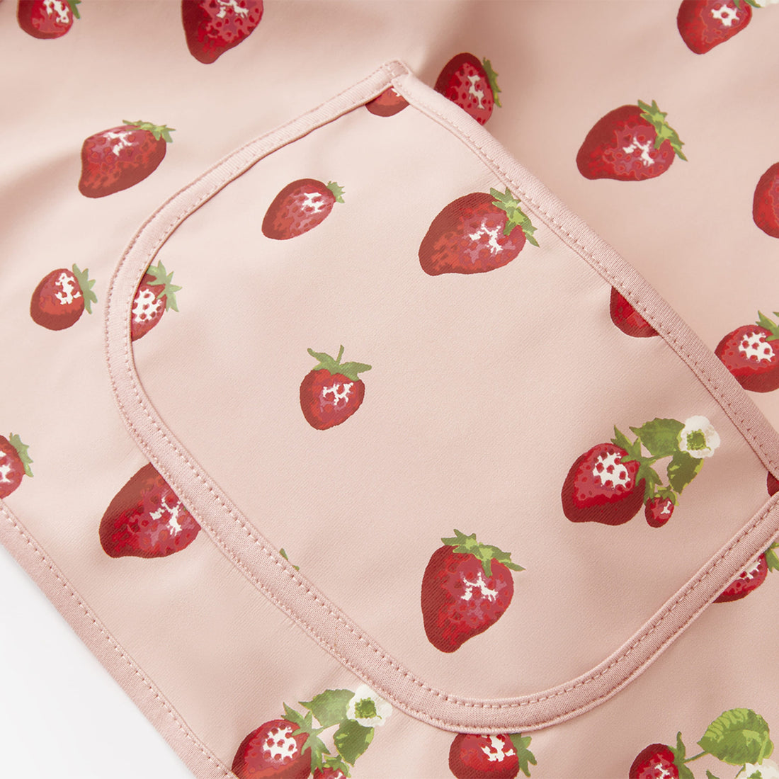 Pink fabric with strawberry pattern