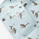 Light blue fabric with goose pattern on a white background