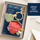 Strawberry-themed plush toy with silicone teether in packaging, labeled 'Itzy Pal', on a beige background.